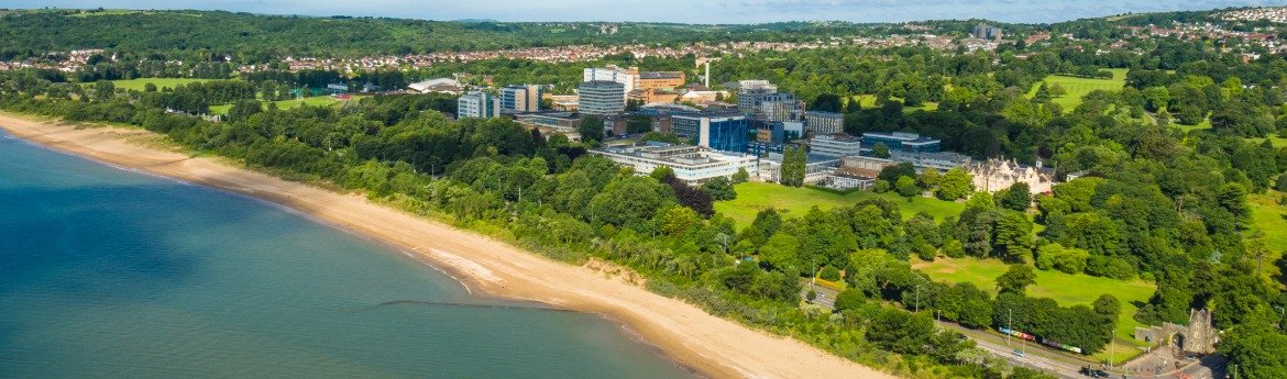 Aerial view of Swansea University from the bay.
