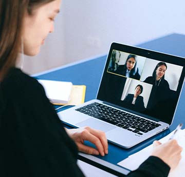someone taking part in an online meeting using zoom