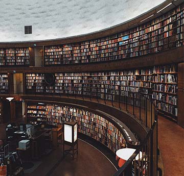 shelves full of books in a library
