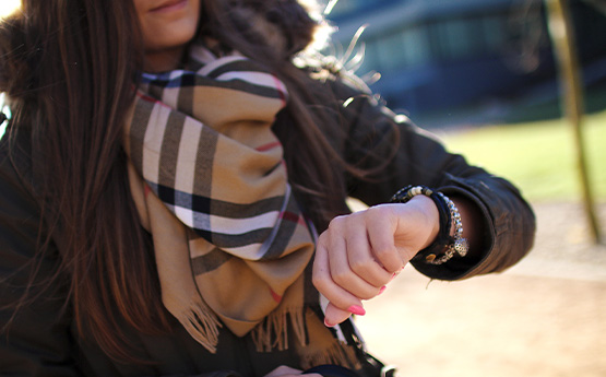 A woman checking her watch