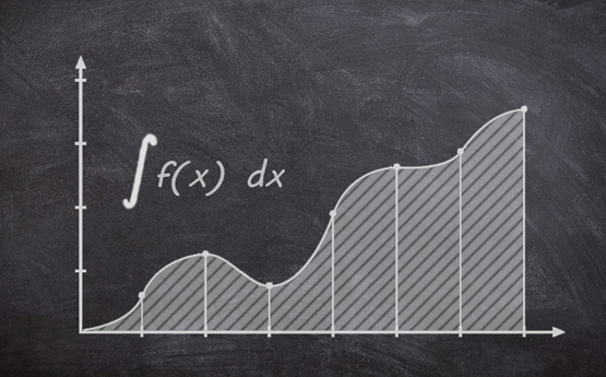 The graph of a function drawn on a blackboard. The area underneath the line has been shaded.
