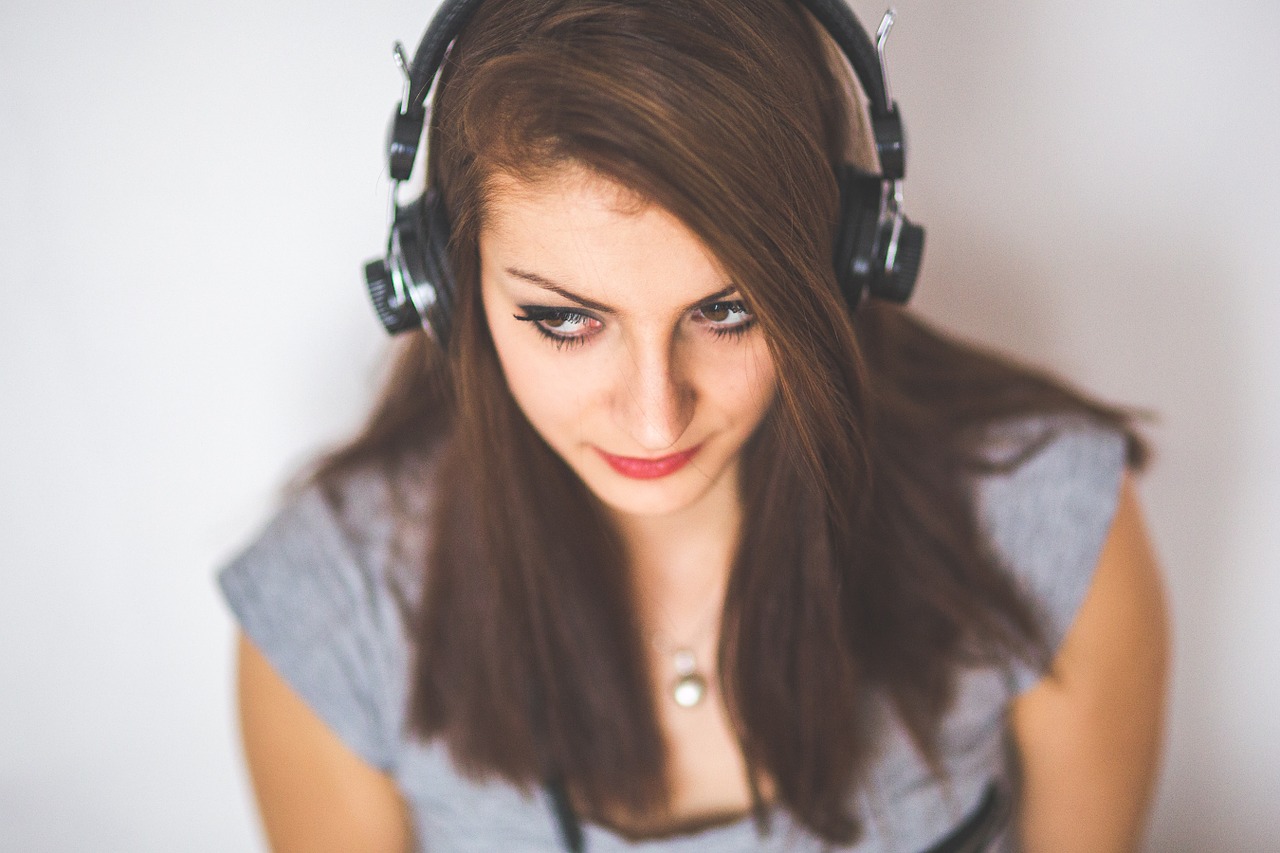 A girl wearing headphones