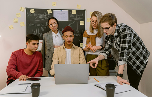 a group of students looking at feedback