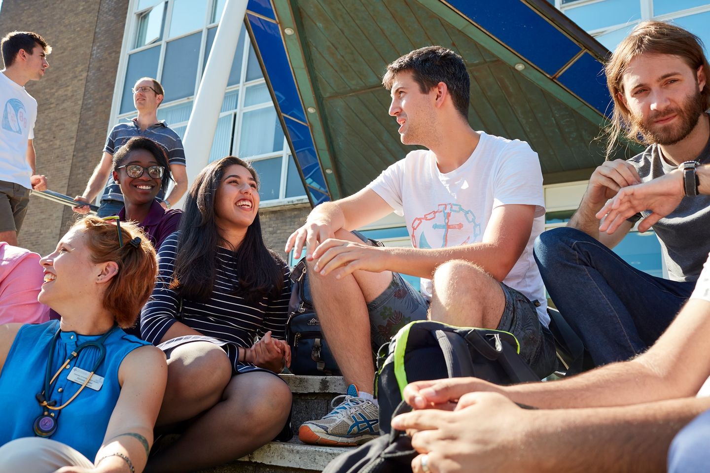 Students sitting on step