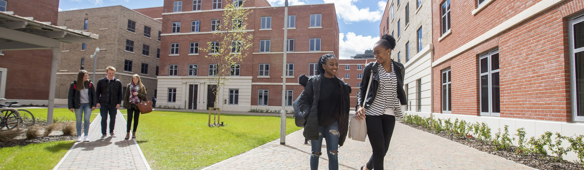 Students walking through Swansea University Bay Campus