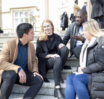 Marketing Toolkit- Students sat outside Law 