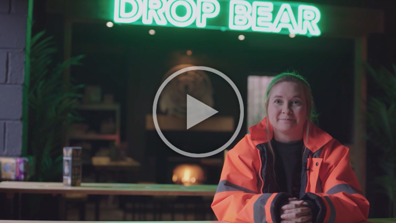 joelle from drop bear beer in her brewery, sat at a table