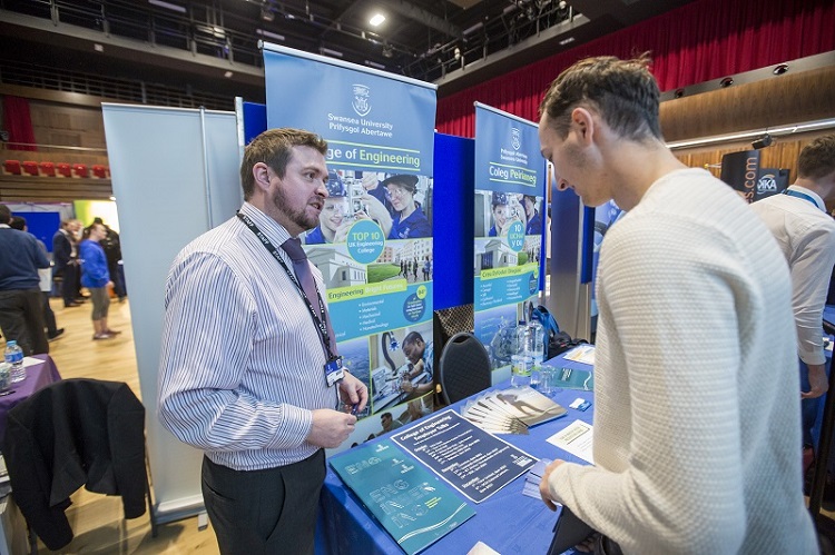 Delegate and student at a Careers Fair