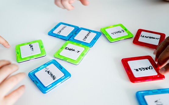 Mini whiteboards on table