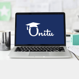 Open laptop with white Unitu logo on navy screen
